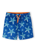 Boys swimming shorts in royal blue with starfish print, front view, featuring an elasticated waistband and drawstring.