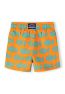 Orange boys swim shorts with turquoise fish print and elastic waistband showcasing a playful kids fashion design.