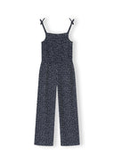 Girls patterned sleeveless jumpsuit with adjustable tie straps and a structured fitted design for casual wear