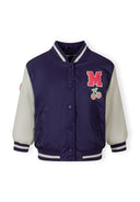 Navy and white varsity bomber jacket for girls with cherry and letter M patches and striped cuffs and collar design