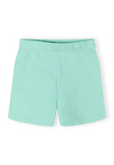 Pastel green girls cotton stretch bike shorts featuring a simple, comfortable design for toddlers and young kids.