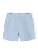 Light blue girls bicycle shorts with a simple design, perfect for comfortable kids and baby fashion wear.