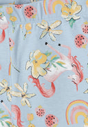 Close-up of soft blue girls bicycle shorts featuring colorful unicorns, flowers, rainbows, and strawberry designs.