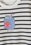 Close-up of striped kids sweatshirt with cute apple juice carton print and striped straw design.