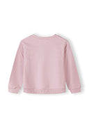 Back view of a soft pink girls sweatshirt with ribbed cuffs and hem, featuring a simple and cozy design.