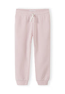 Light pink joggers for girls with elastic waistband and drawstring, featuring a comfortable and stylish design.