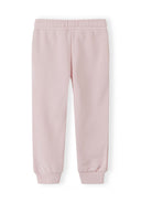 Light pink kids joggers with elastic waistband and ribbed cuffs, designed for comfort and casual wear.