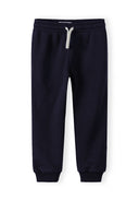 Navy joggers for girls with elastic waistband and side pockets, designed for comfort and everyday wear