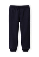 Navy joggers for girls with elastic waist and cuffed ankles, featuring a practical side pocket design.