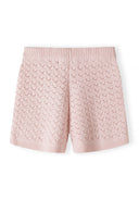 Soft pink knit shorts for girls featuring a delicate pointelle design and comfortable waistband detail