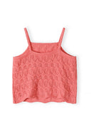 Coral pink crochet vest with delicate knit pattern, designed for comfort and style in kids and baby fashion.