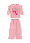 Pink cotton blend girls tracksuit with cherry design and ruffle details, featuring adjustable waistband pants.
