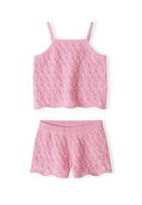 Pink crochet two-piece set for girls with intricate knit design and comfortable elastic waistband shorts.