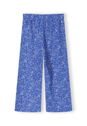 Blue floral pattern loose fit trousers designed for girls with an adjustable waistband for a comfortable fit.