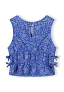 Blue floral sleeveless girls top with side ties and a keyhole button closure back design for a loose fit look.