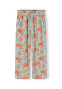 Light blue girls' pants with orange floral design and elastic waistband, stylish kids fashion for ages 3-15 years