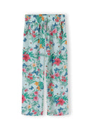 Kids wide-leg pants with colorful tropical floral and butterfly print on mint green fabric design.