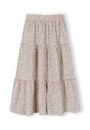 Cream maxi skirt with delicate floral pattern and elastic waistband designed for girls aged 3 to 15 years