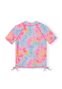Colorful pink blue tie-dye girls rash vest with short sleeves and adjustable side ties, featuring vibrant UV protective design.