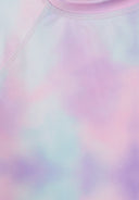 Close-up of soft pink and blue gradient fabric with detailed stitching on a long sleeve rash vest for kids.