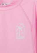 Close-up of pink kids rash vest with palm tree design and detailed stitching for a stylish look.