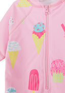 Close-up of pink kids rashguard with colorful ice cream cone and popsicle print, short sleeves, and front zipper design.