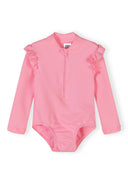 Light pink long sleeve girls swimsuit with textured fabric and ruffle details for sun protection design