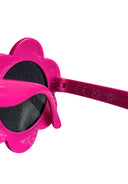 Close-up of bright pink kids sunglasses with flower-shaped frames and dark lenses designed for children.