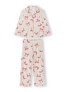 White girls’ long sleeve pajamas with pink bow print, lapel collar, and elasticated waist featuring a charming design.