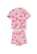 Girls pink short sleeve pyjama set featuring a repeated bright bow design with a soft, breathable fabric finish.