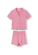 Pink short sleeve girls pajamas set with white piping details and elastic waistband shorts design