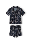 Navy satin girls' pyjama set featuring a unique bow print design with button front and short sleeves.