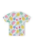 White children’s cotton t-shirt with colorful smiling fruit print featuring pineapples, watermelons, apples, strawberries, and blueberries.