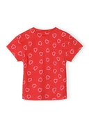 Red cotton girls t-shirt with an all-over white heart print design, suitable for kids aged 3 to 7 years.