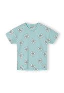 Light blue girls cotton t-shirt with all-over white bow print, featuring a simple and charming design.