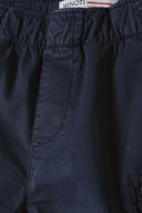 Boys casual combat shorts elasticated waistband navy 1-14y with elasticated waist and side pocket detail. Comfort-focused design.