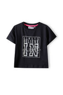 Girls cropped oversized top black 3-14y featuring a motivational print, soft fabric, and relaxed fit for comfort.