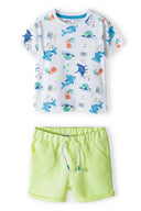 Boys t-shirt and fleece shorts set all-over print yellow 3m-3y. Colorful short-sleeved t-shirt with marine prints paired with bright yellow fleece shorts. Soft, breathable fabric ensures comfort.
