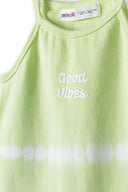 Lime green girls tie dye rib vest with 'Good Vibes' text. Soft ribbed fabric. Designed for ages 3-14 years. Comfortable summer wear.