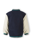 Boys baseball jacket in navy blue and cream with teal striped trim