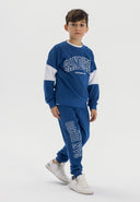 Boys crew neck sweatshirt and joggers set with print cobalt blue 3-14y, featuring contrast sleeves and logo print. Soft cotton fleece.