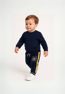 Boys fleece jogpant in navy blue with yellow side stripes and M logo