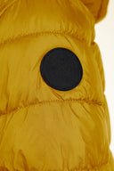 Vibrant mustard yellow boys padded jacket with black shoulder patch