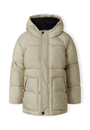 Beige boys padded jacket with quilted hood, raglan sleeves, black-lined hood and front pockets