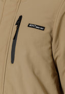 Boys parka jacket in beige puffer with quilted hood, black zipper and patch