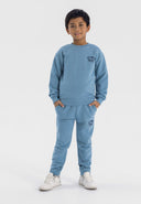 Boys sweatshirt and joggers set lightweight blue 1-8y made from soft cotton fleece, featuring classic crew neck and elasticated waistband.  