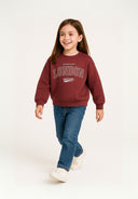 Maroon girls crew sweatshirt with London welcome print