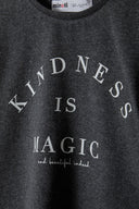 Girls long sleeve graphic tee in dark gray heather cotton with kindness is magic print