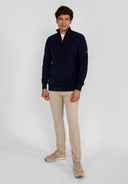 Navy blue half zip jumper with subtle logo on sleeve